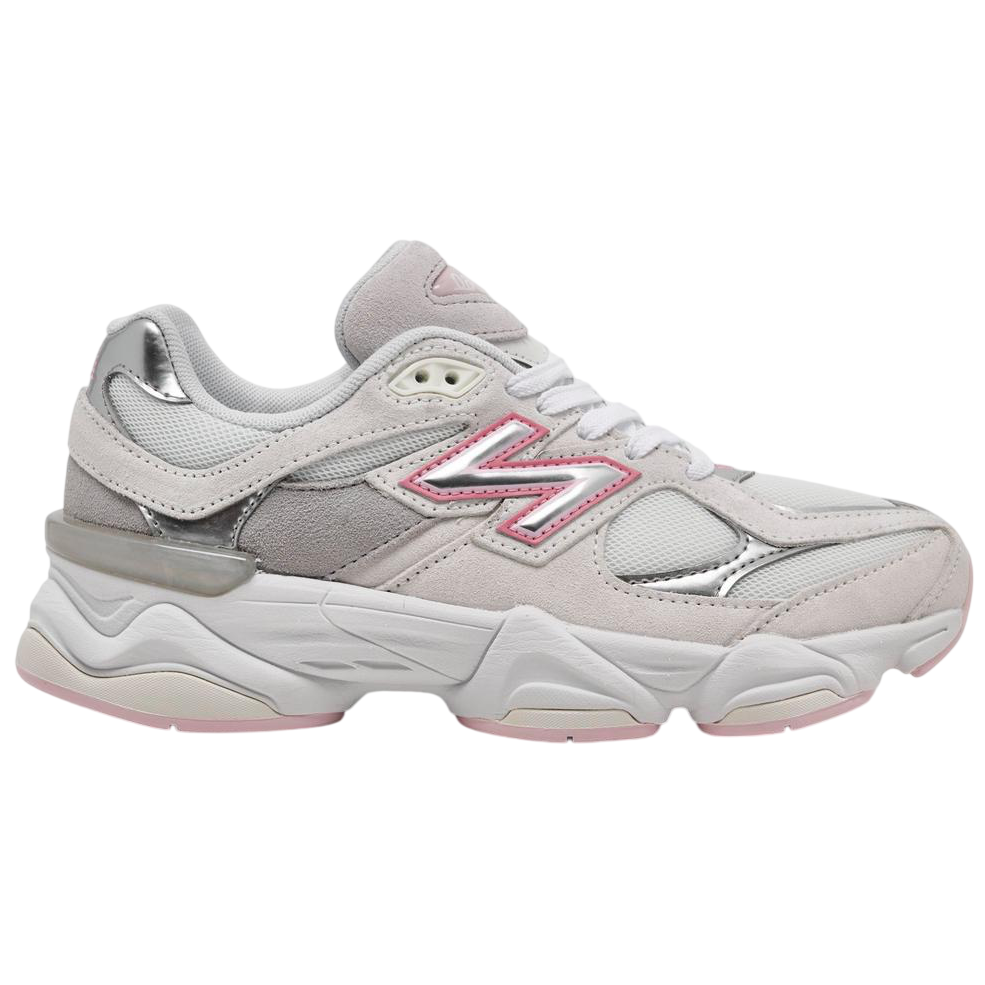 White sneaker with pink accents on a white background