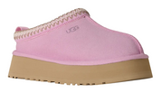 Pink UGG slip-on shoe with brown sole on a white background