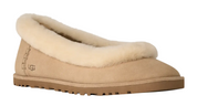 Beige UGG slipper on a white background