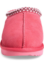 Pink slip-on shoe with a textured sole on a white background - Image 5