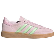 Pink Adidas sneaker with green stripes on a white background