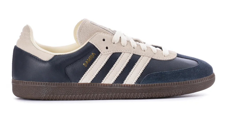 Navy and white Adidas sneaker on a white background