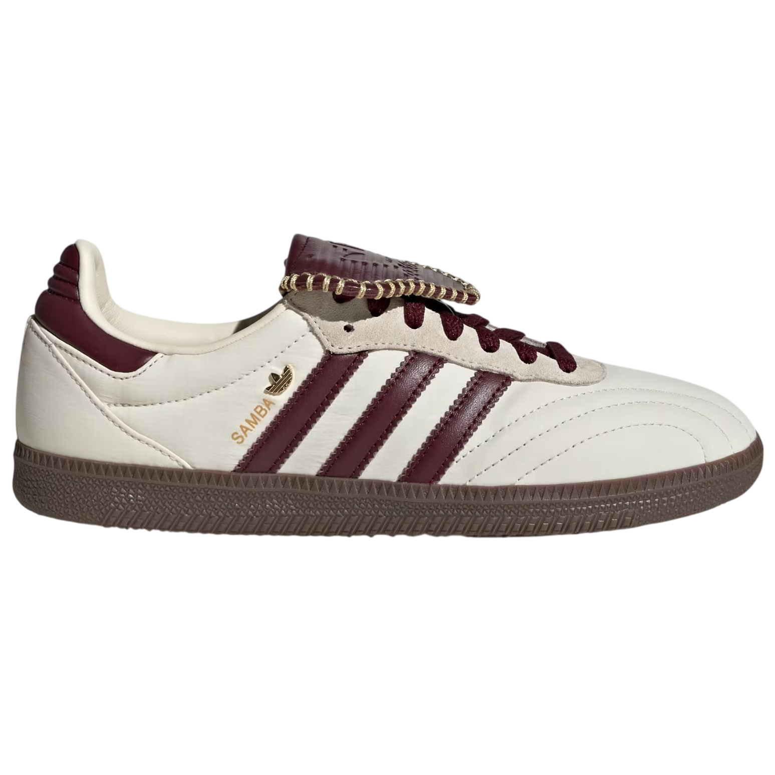White and burgundy Adidas sneaker on a white background