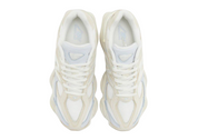 Pair of white sneakers on a white background