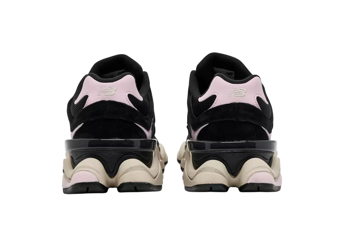 Black and pink sneakers with a unique sole design on a white background