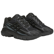 Pair of black sneakers on a white background