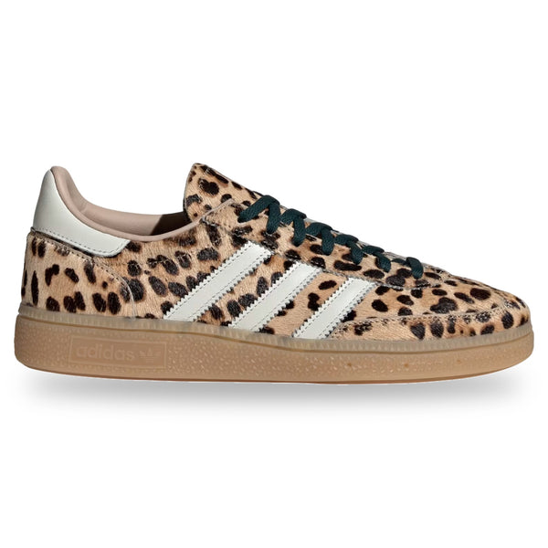 Leopard print sneaker with white stripes on a white background