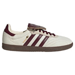White and burgundy Adidas sneaker on a white background - Image 1
