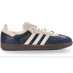 Navy and white Adidas sneaker on a white background - Image 1
