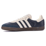 Navy and white sneaker with three stripes on a white background - Image 3