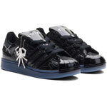 Black sneakers with a spider logo on a white background - Image 2