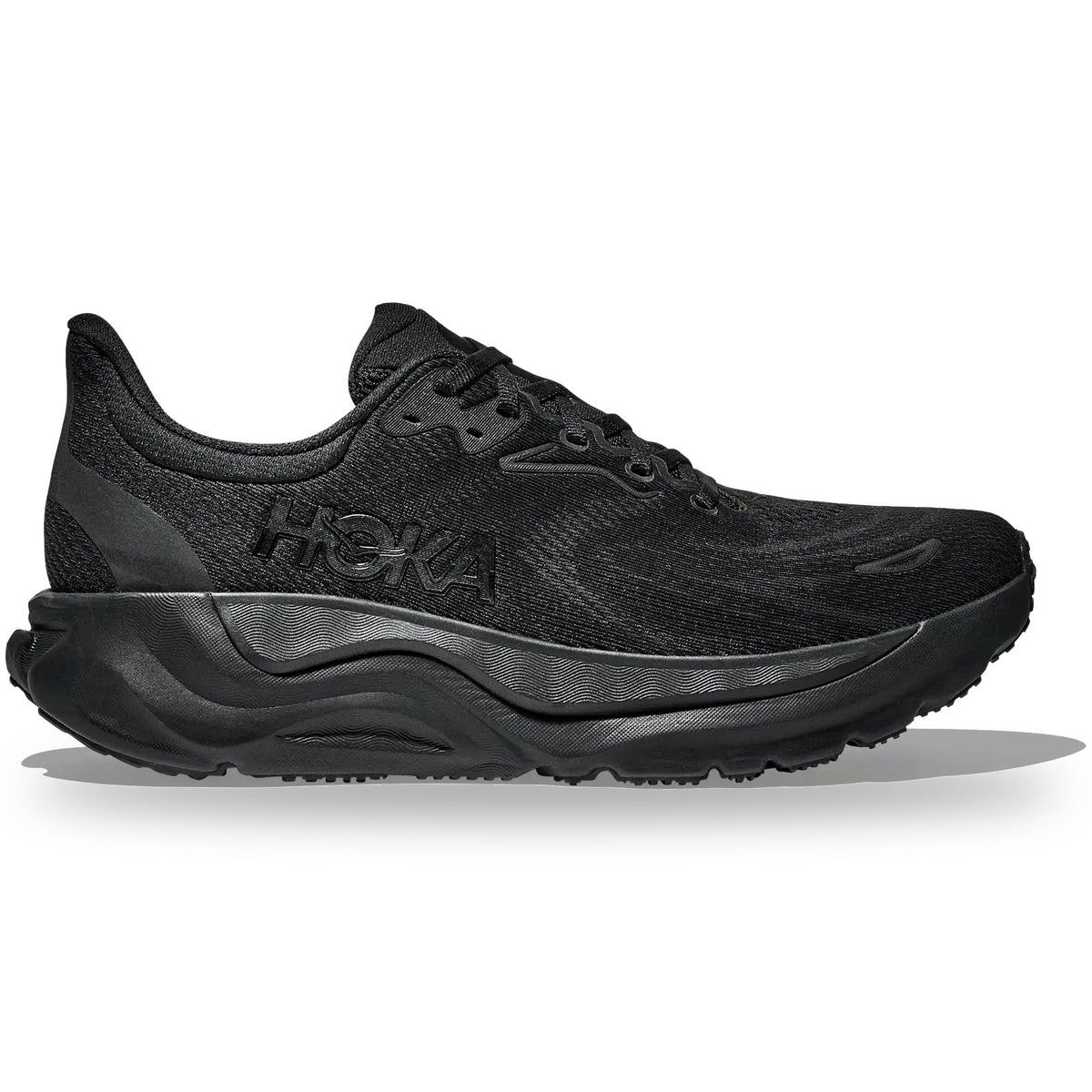 Black Hoka running shoe on a white background