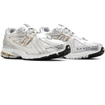 White running shoes with gold accents on a white background - Image 3