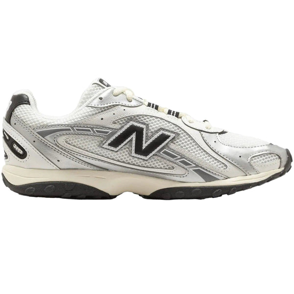 White New Balance sneaker with black logo on a white background