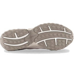 Close-up of a gray shoe sole with New Balance branding on a white background - Image 5