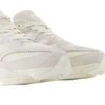 Pair of white sneakers on a light gray background - Image 2
