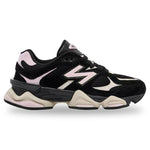 Black and pink sneaker with New Balance logo on a white background - Image 1