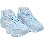 Light blue sneakers with white accents on a white background - Image 5