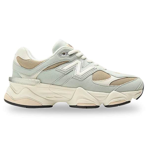 White sneaker with beige accents on a white background