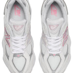 White sneakers with pink accents on a white background - Image 4