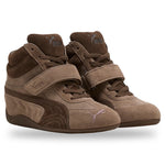 Pair of brown Puma sneakers with velcro straps on a white background - Image 2