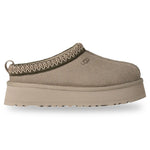 Beige slip-on shoe with platform sole on a white background - Image 1